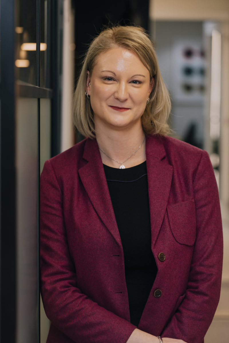 image of dispensing optician smiling and looking professional